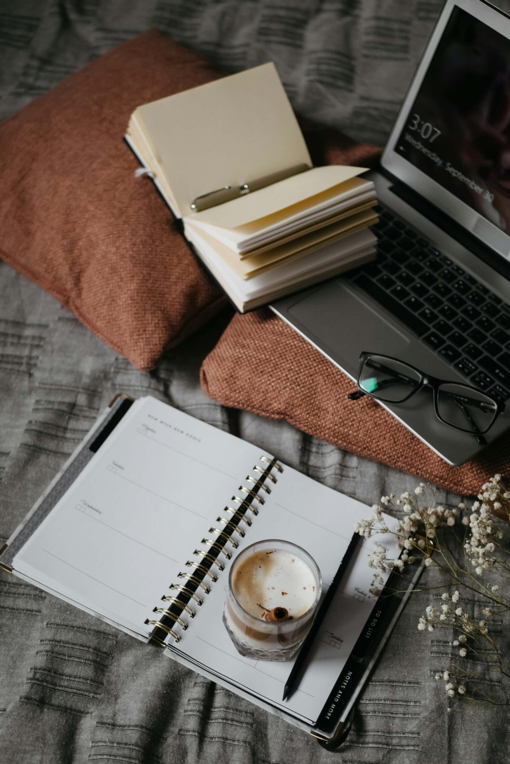 work from home set up with laptop notebook and coffee for quiet marketing